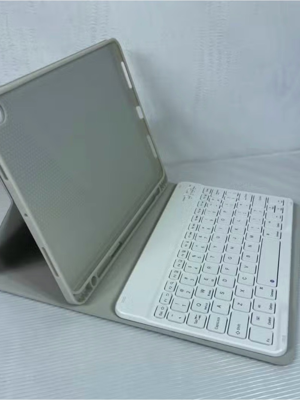 Portable Bluetooth Keyboard with Attached Tablet Case - Great for On-the-Go!